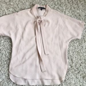 This is cream dress shirt with a tie